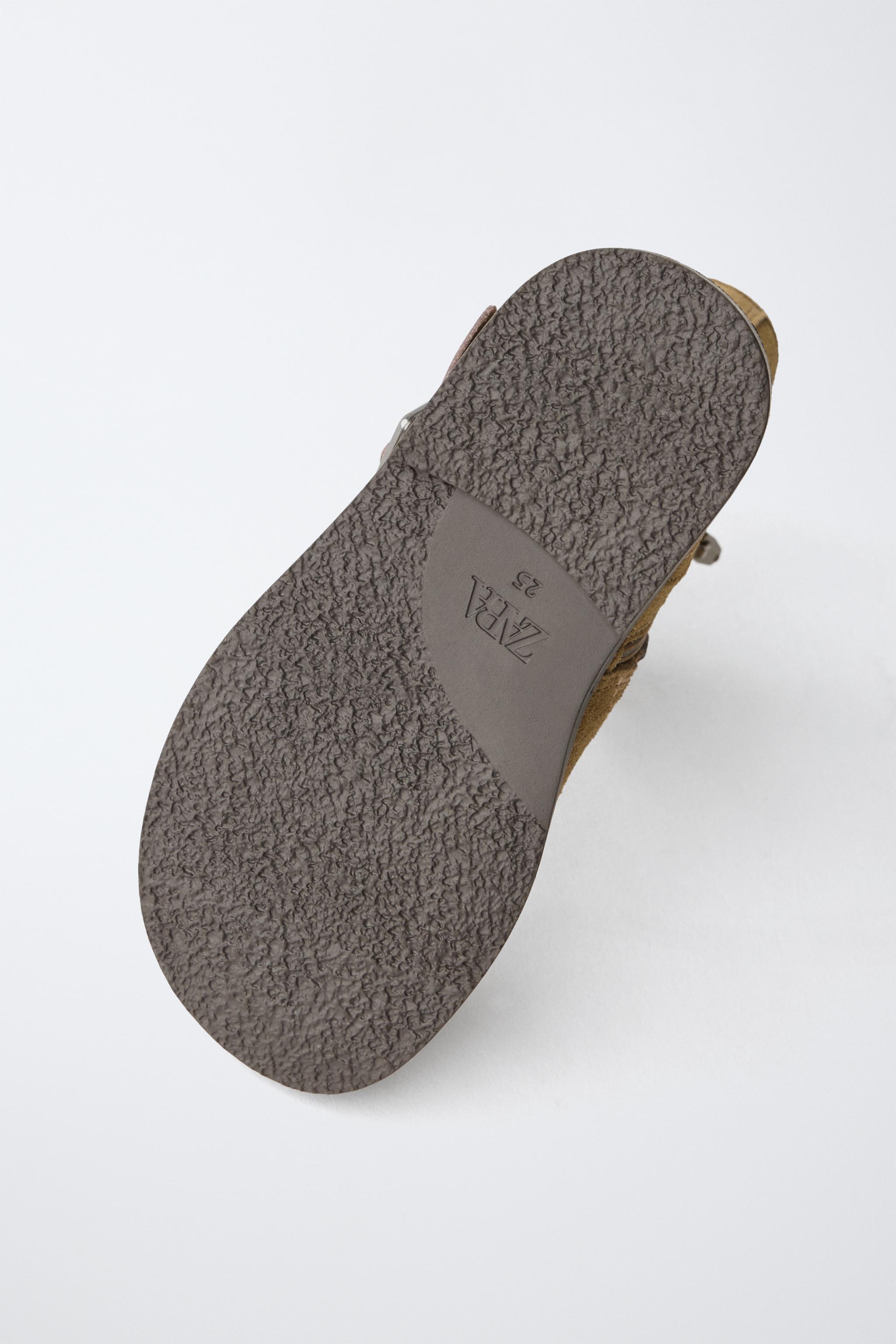 BOTTINES EN CUIR À DOUBLE BOUCLE